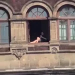 MUJER ASOLEANDOSE PALACIO NACIONAL 3