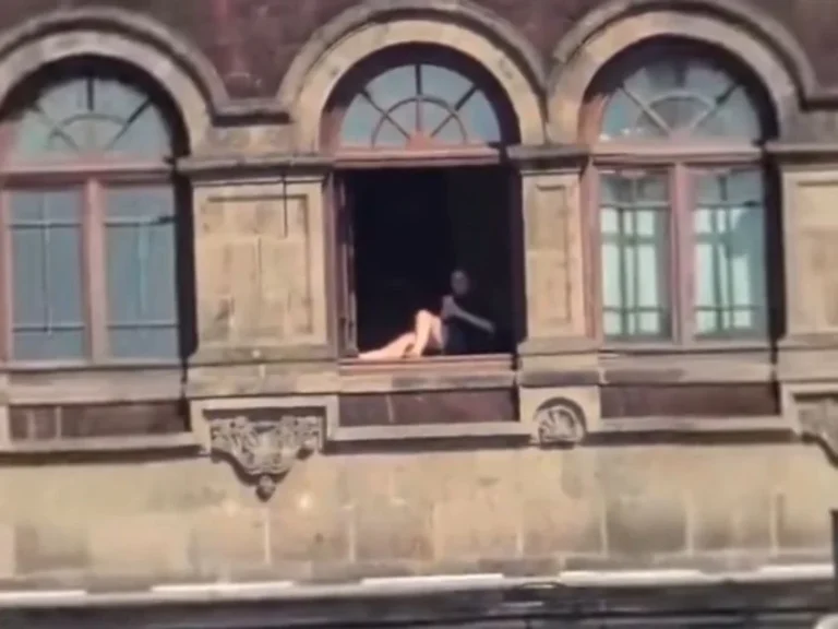 MUJER ASOLEANDOSE PALACIO NACIONAL 3